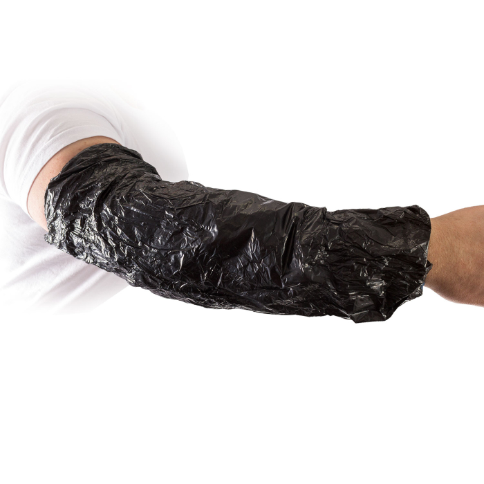 Person wearing a black disposable arm sleeve from Killer Ink on the forearm.